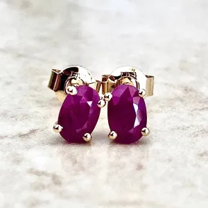 14 Karat Yellow Gold July Birthstone Oval Ruby Stud Earrings