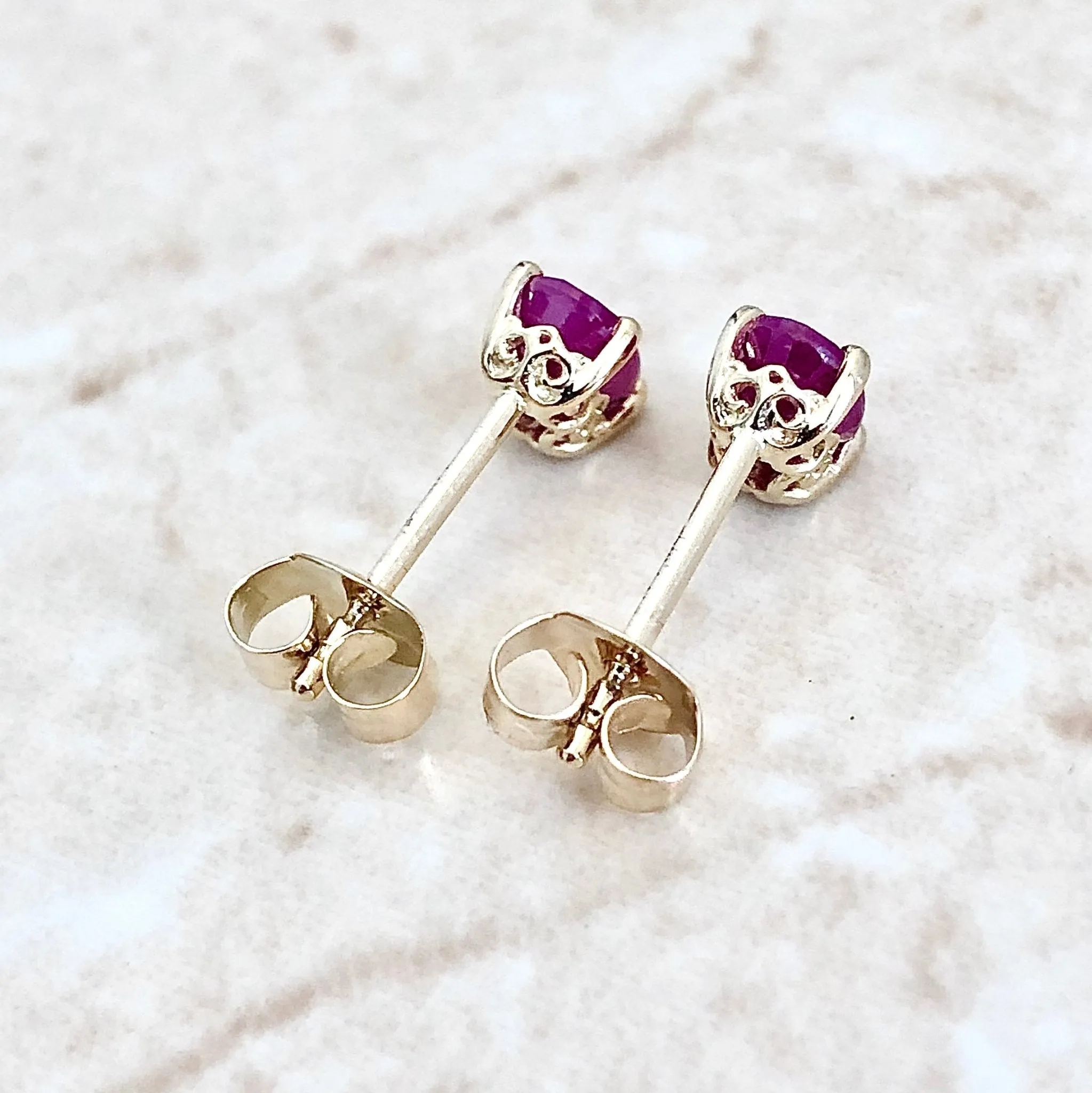 14 Karat Yellow Gold July Birthstone Oval Ruby Stud Earrings