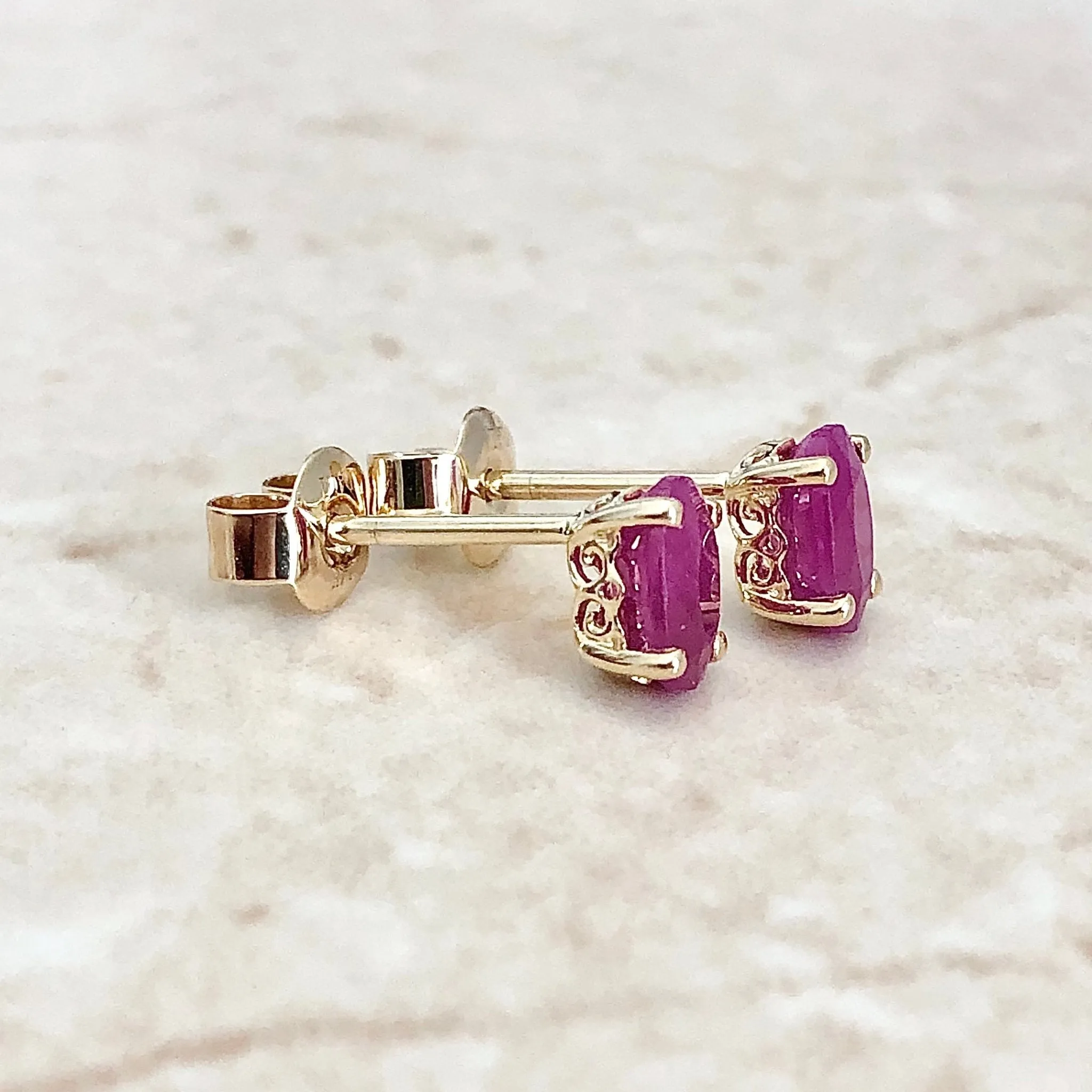 14 Karat Yellow Gold July Birthstone Oval Ruby Stud Earrings