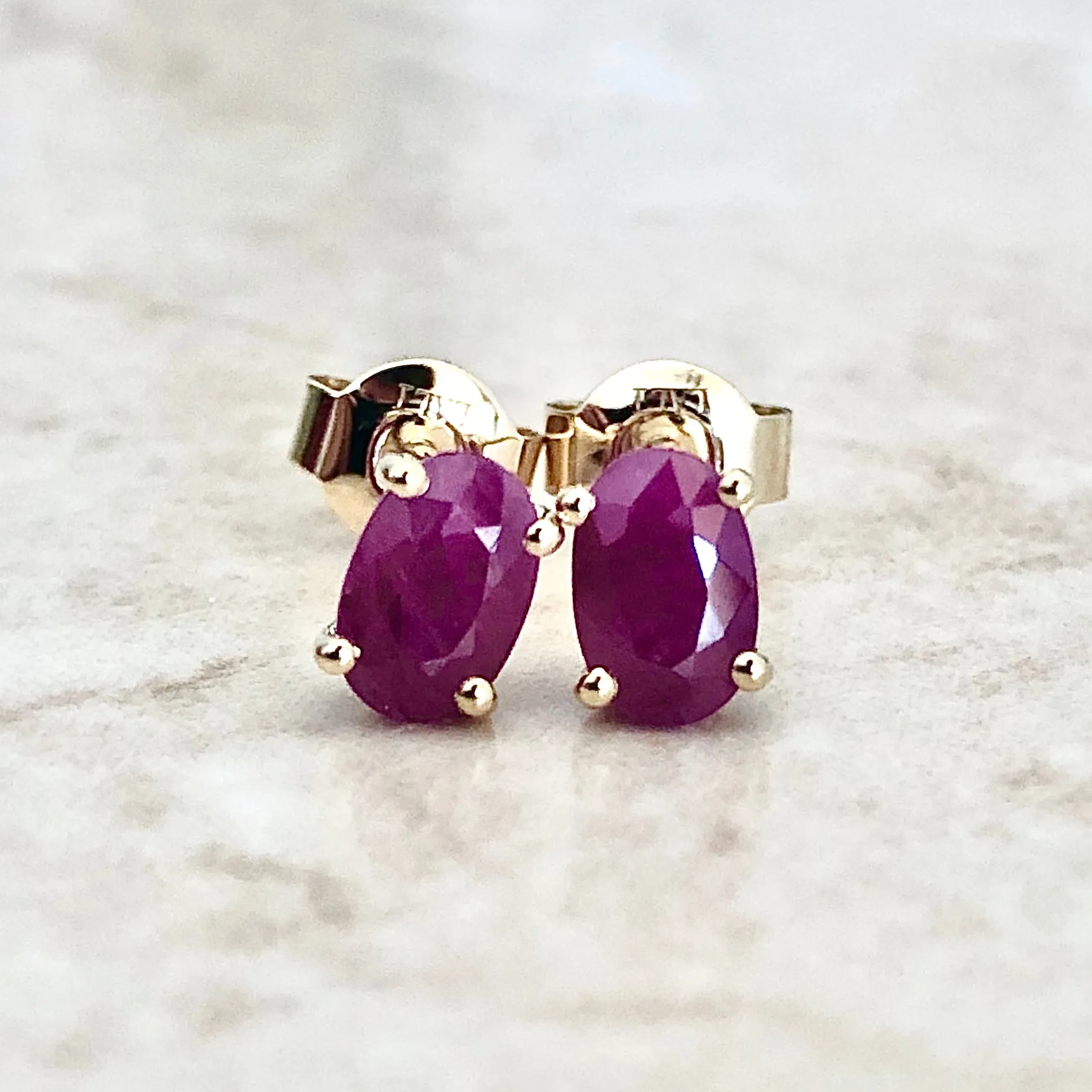 14 Karat Yellow Gold July Birthstone Oval Ruby Stud Earrings