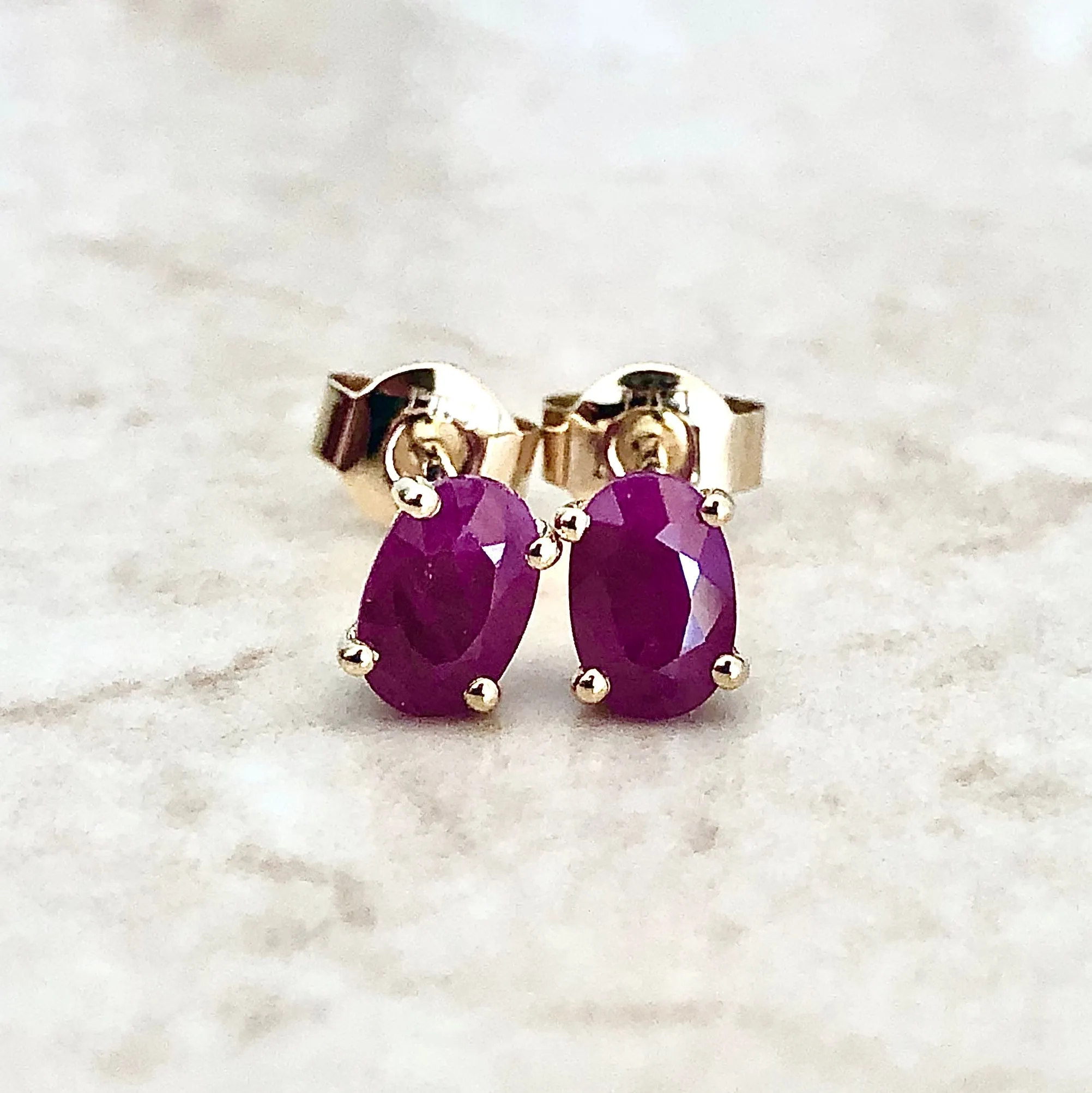 14 Karat Yellow Gold July Birthstone Oval Ruby Stud Earrings