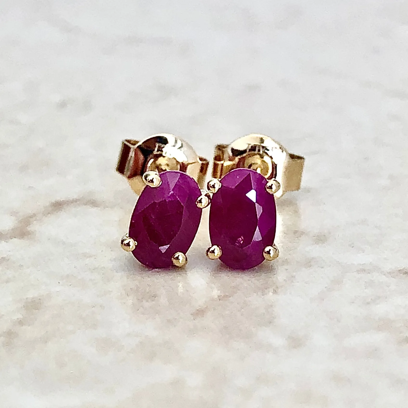 14 Karat Yellow Gold July Birthstone Oval Ruby Stud Earrings