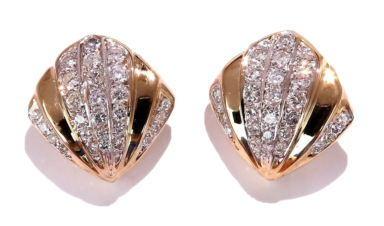 2ct. natural round diamond shell crest clip earrings 14kt