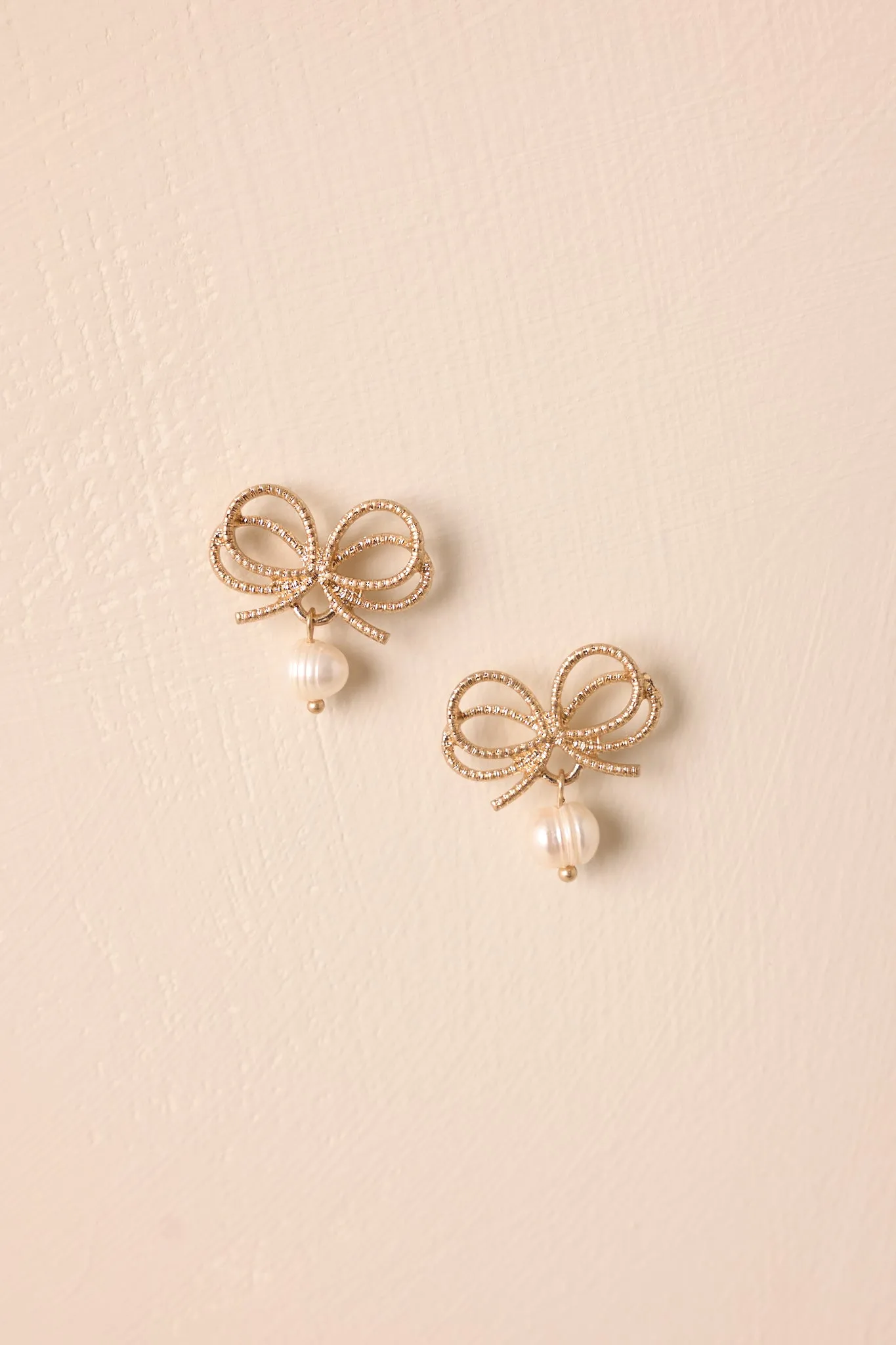 Briar’s Grace Gold Bow Drop Earrings