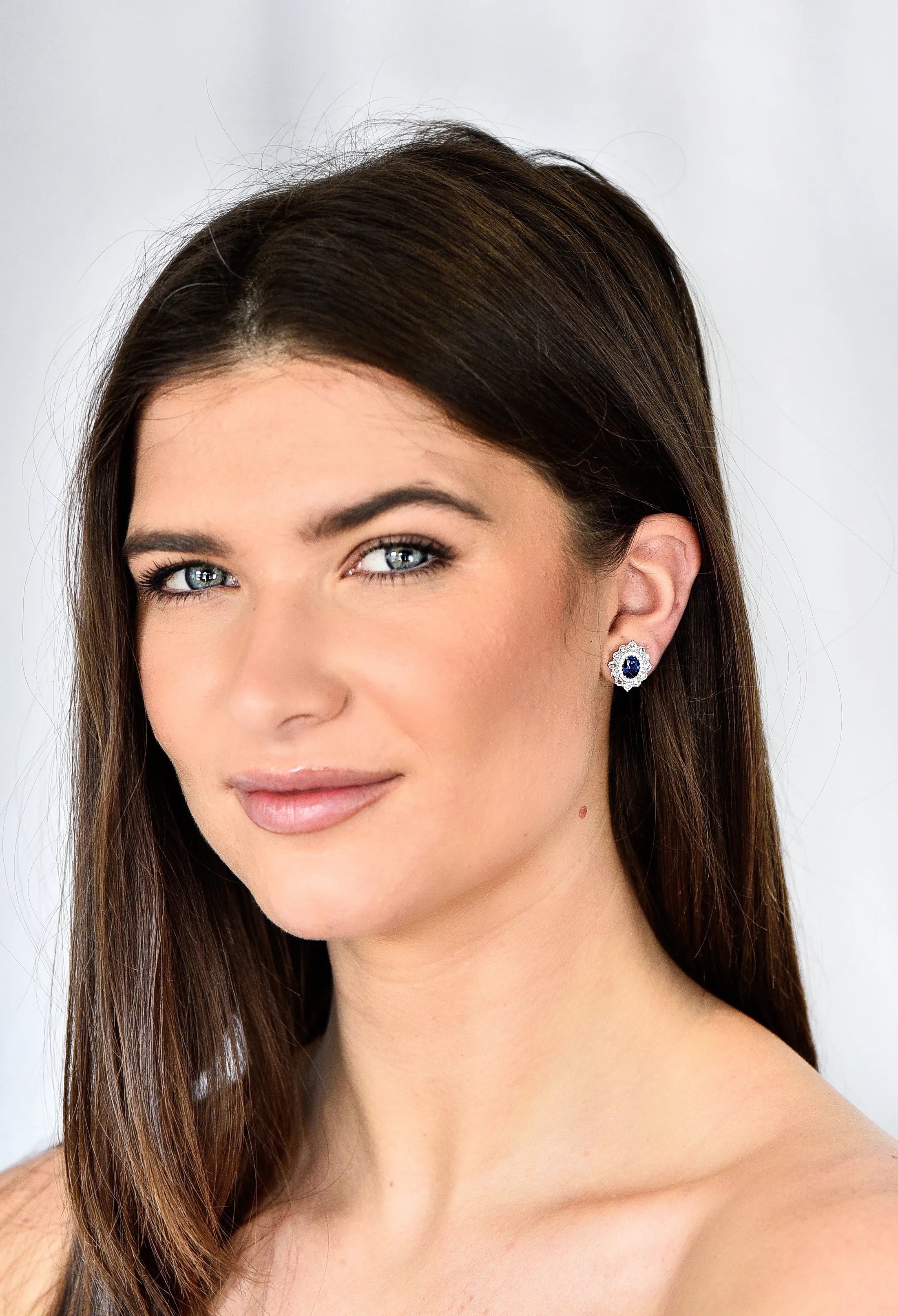 Contemporary 3.00 CTW Oval Cut Sapphire Rose Cut Diamond 18 Karat White Gold Cluster Halo Stud Earrings