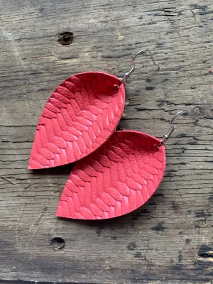 Coral braided leather earrings