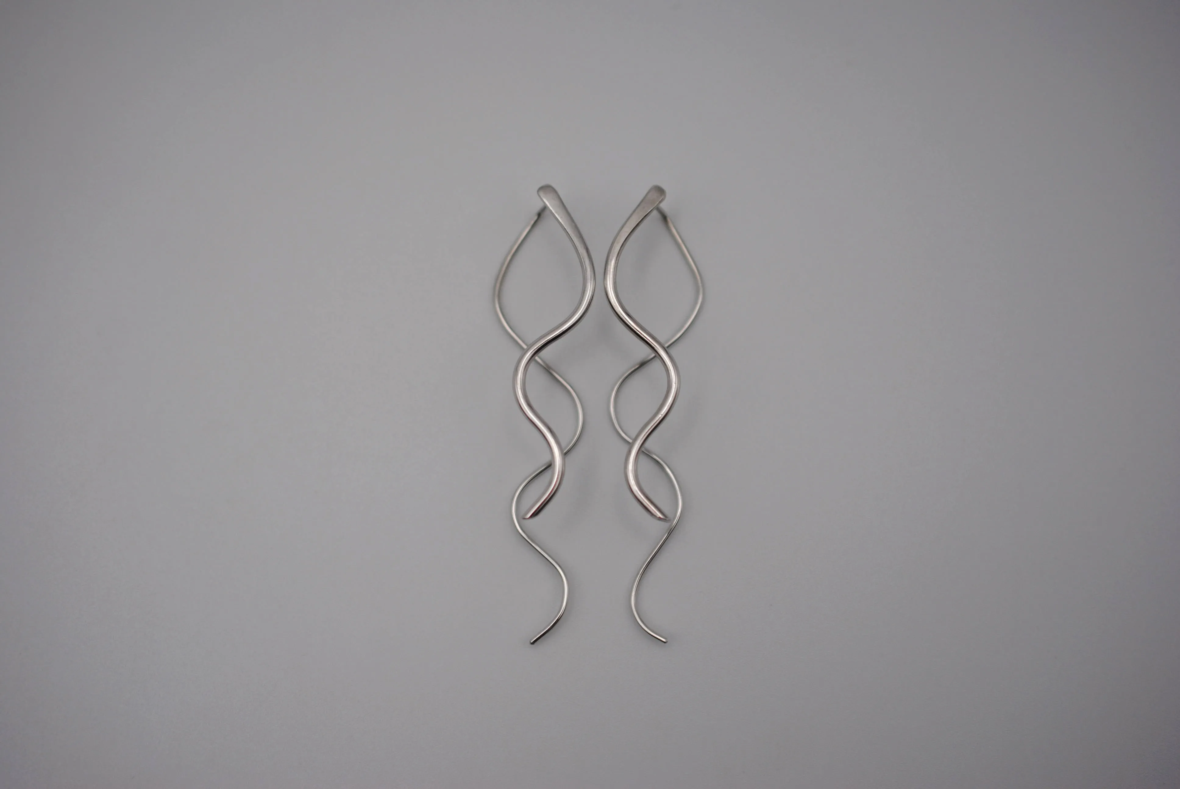 Infinity Rhodium Roots Dangle Earrings