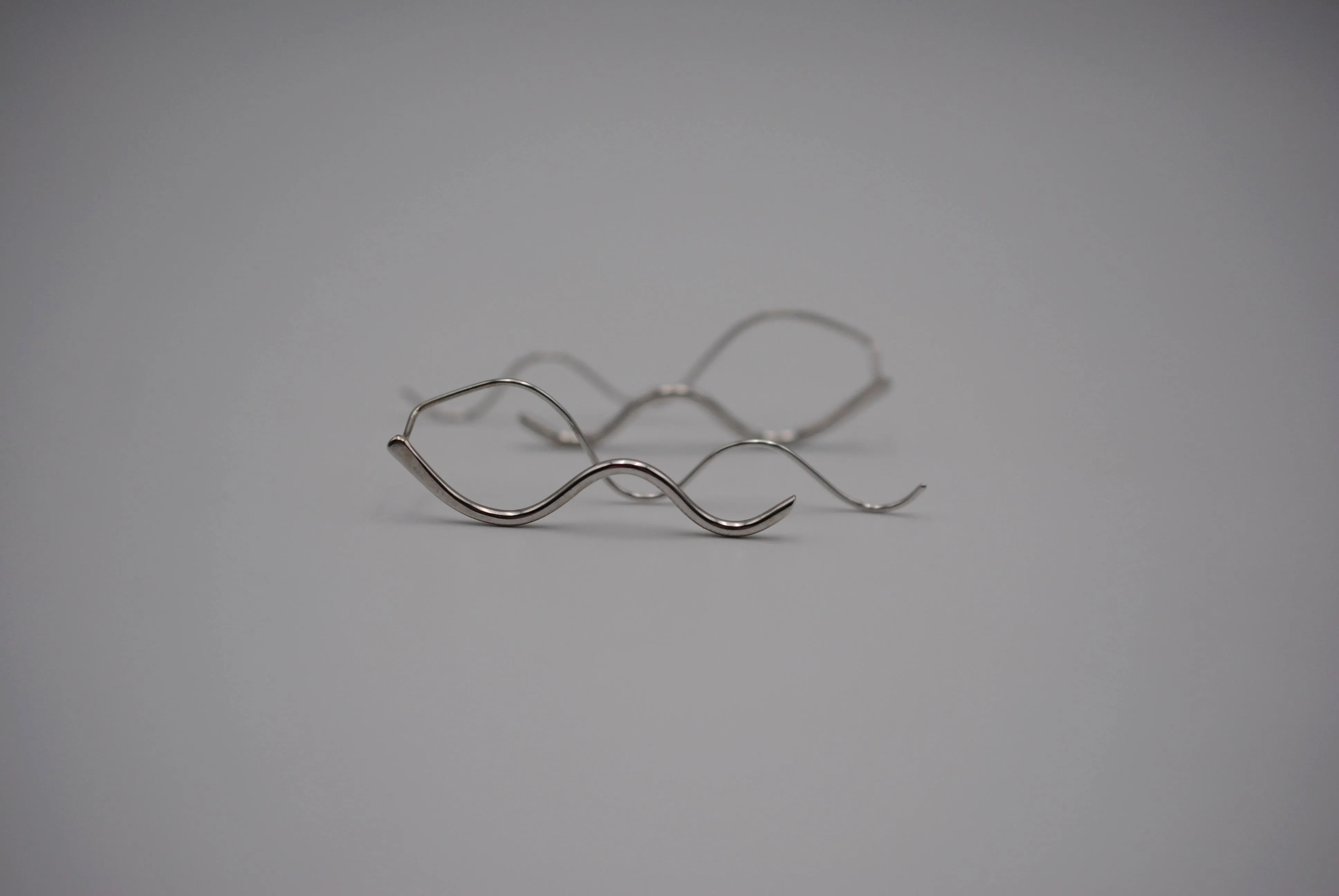 Infinity Rhodium Roots Dangle Earrings