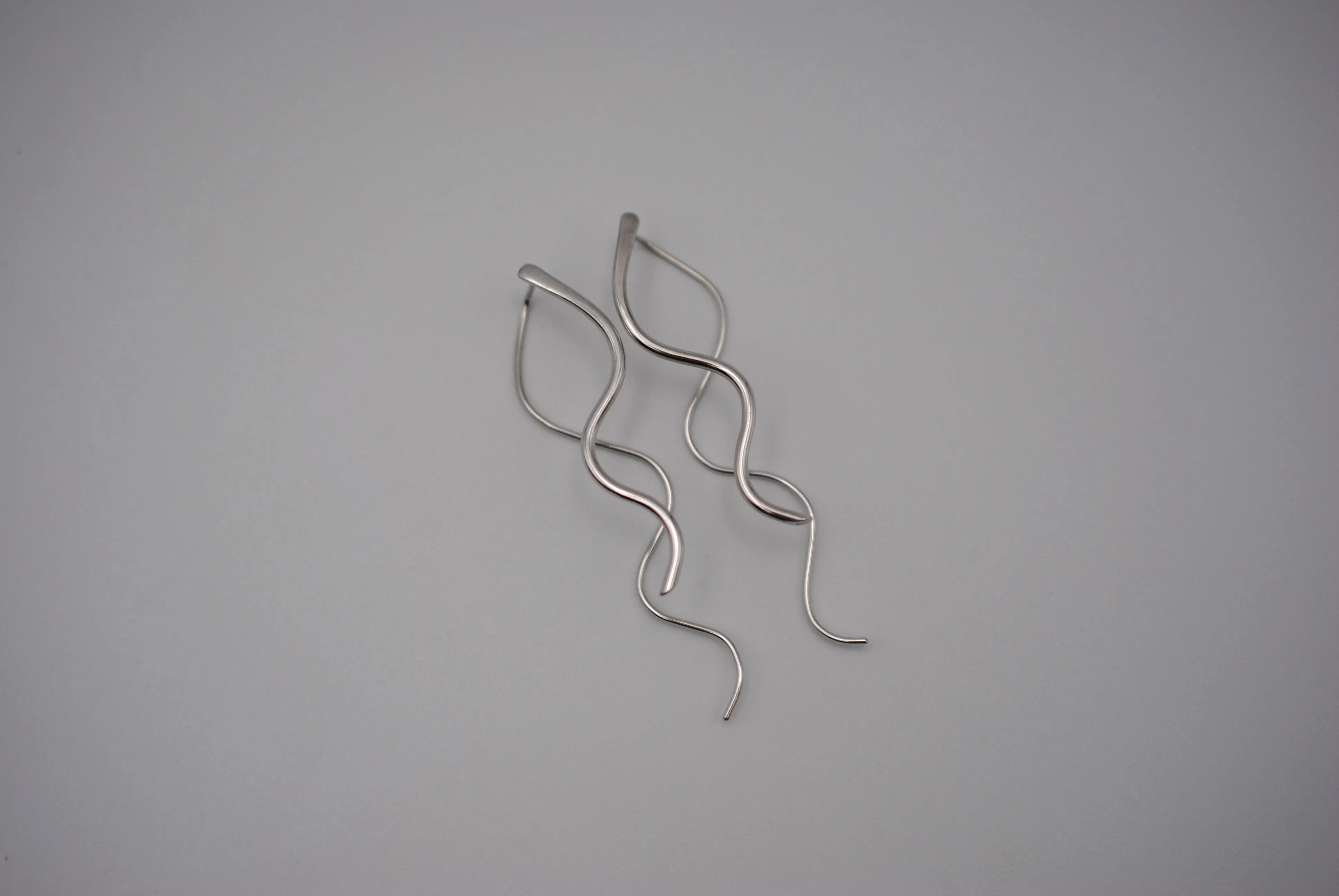 Infinity Rhodium Roots Dangle Earrings