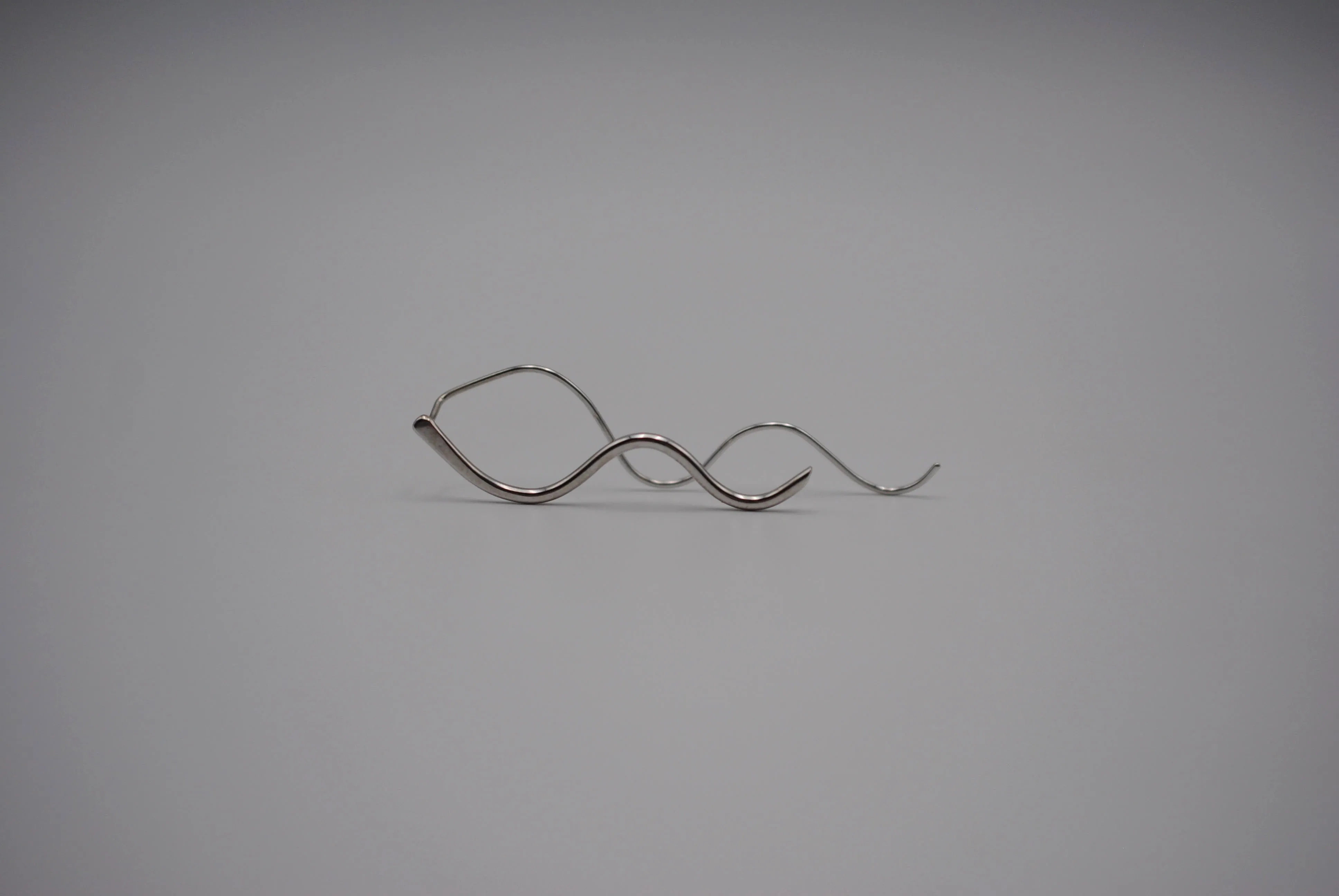 Infinity Rhodium Roots Dangle Earrings