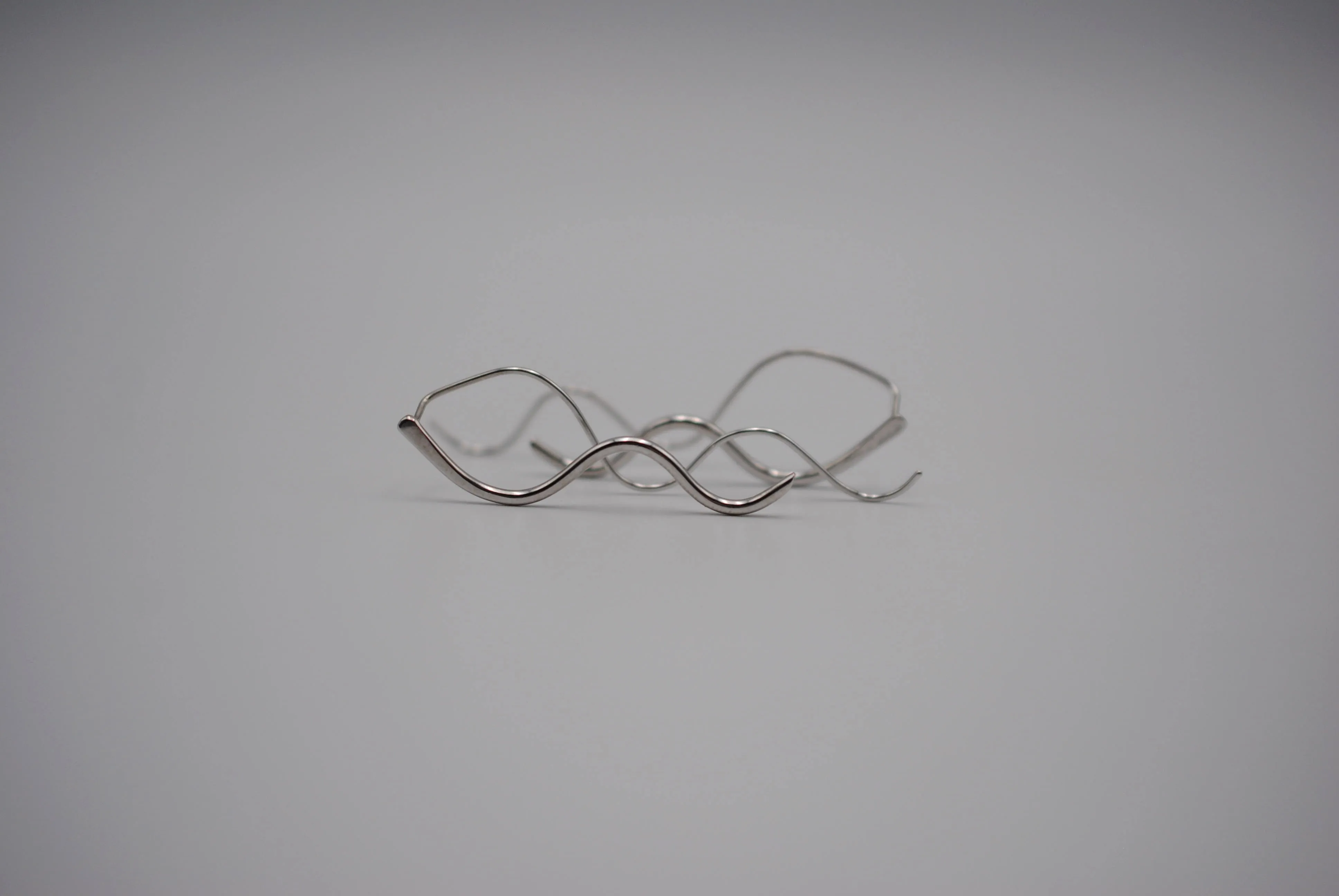 Infinity Rhodium Roots Dangle Earrings