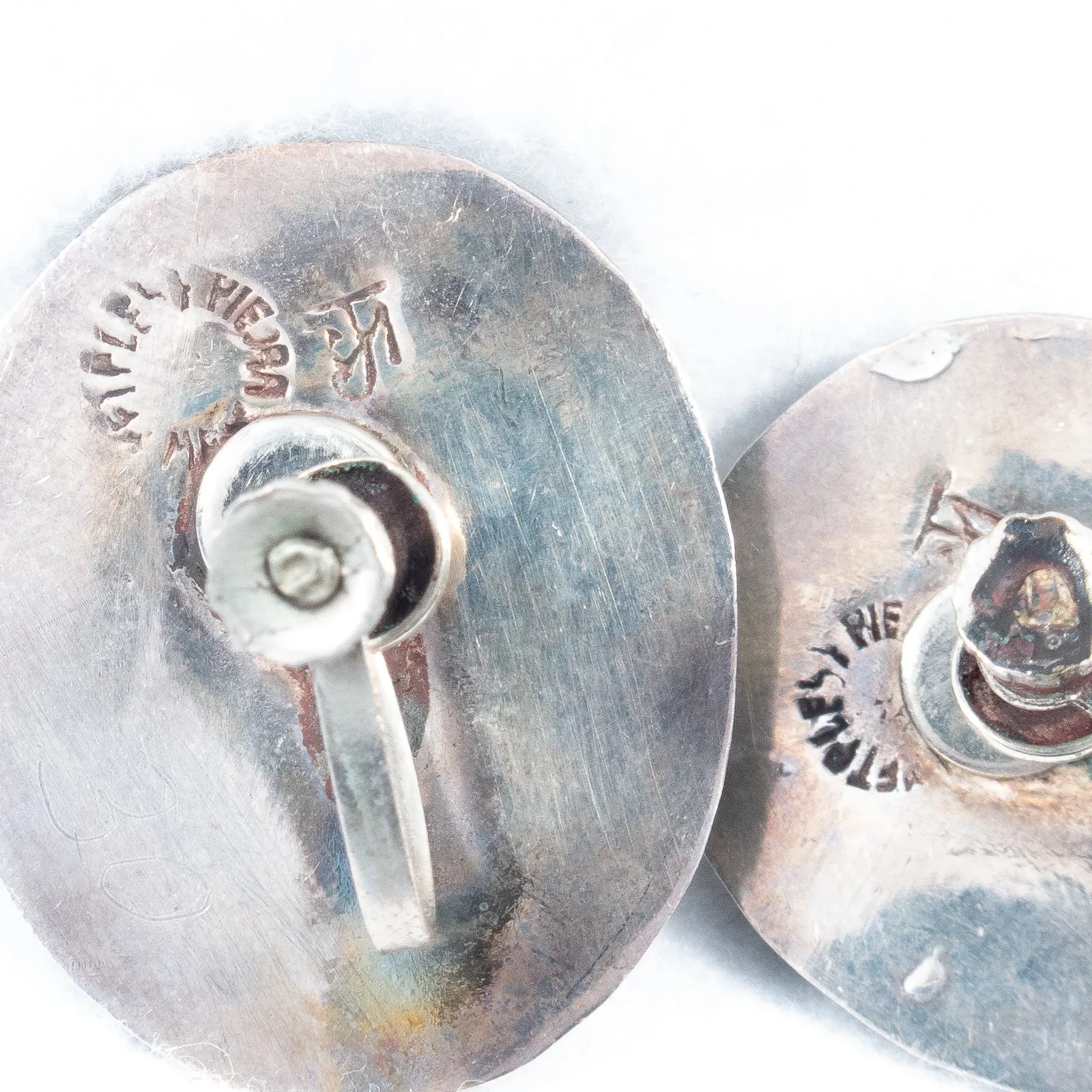 Metales Y Piedra Bird Earrings