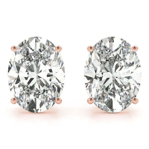 Oval Platinum Moissanite Solitaire 4-Prong Stud Earrings
