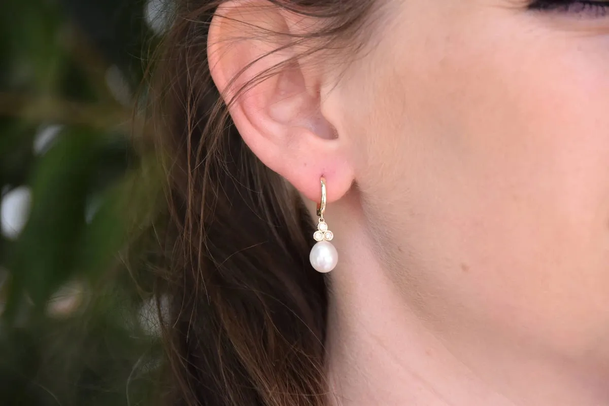 Pearl dangle earrings with diamonds