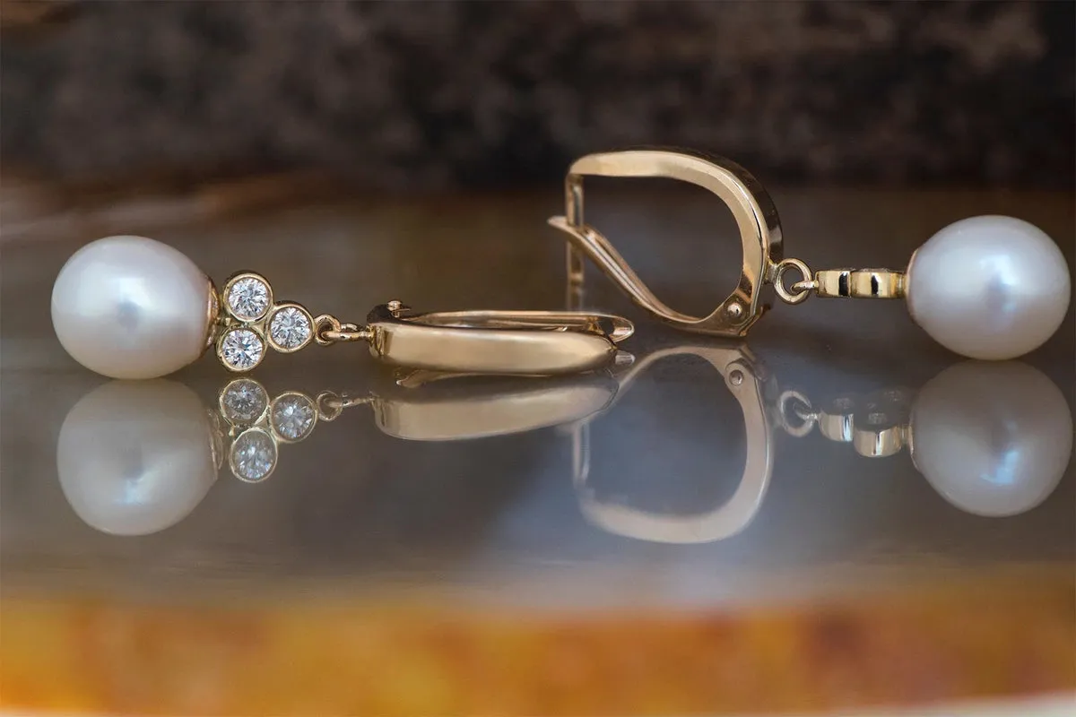 Pearl dangle earrings with diamonds