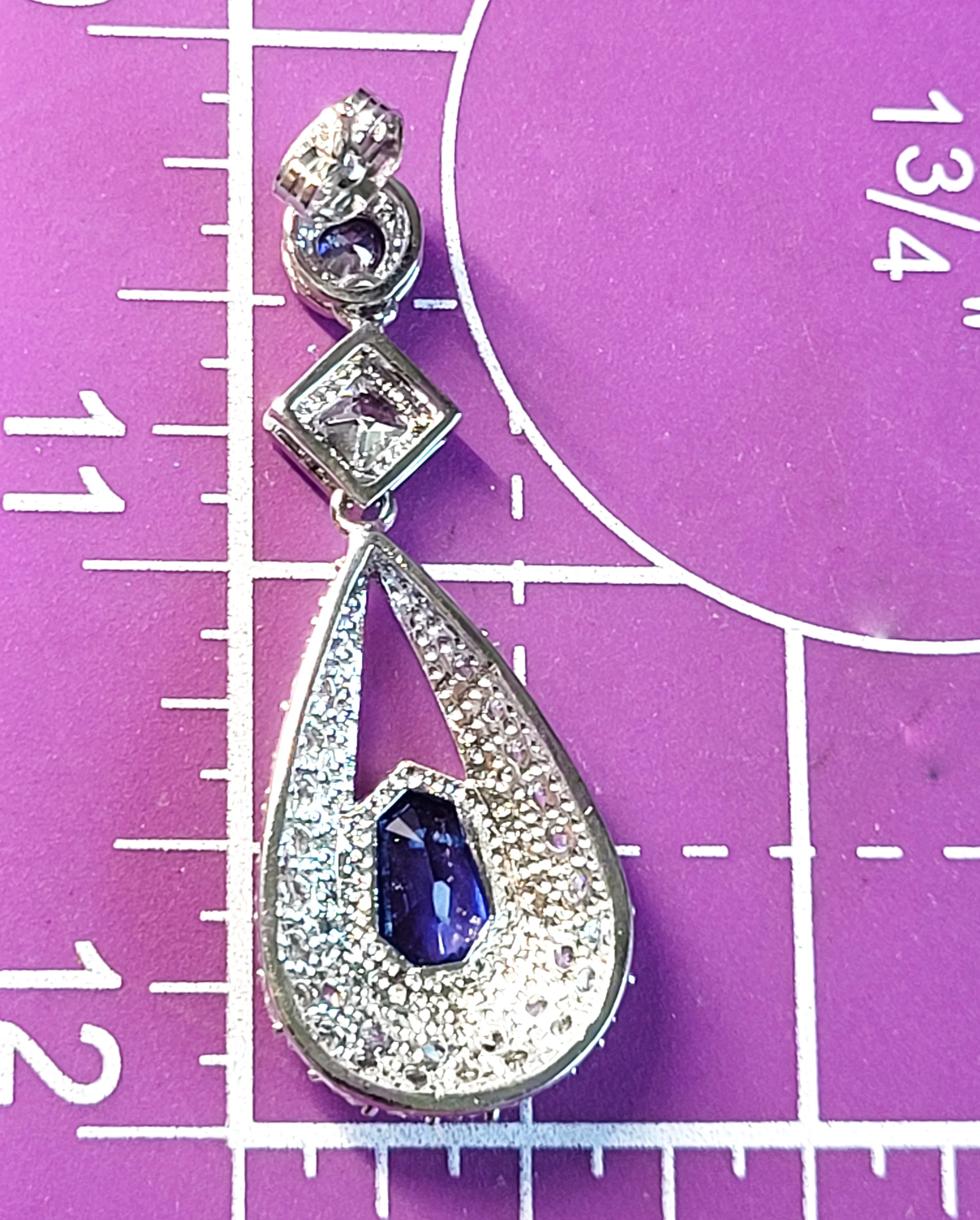 Sapphire blue silver plated princess cut pave set pierced earrings