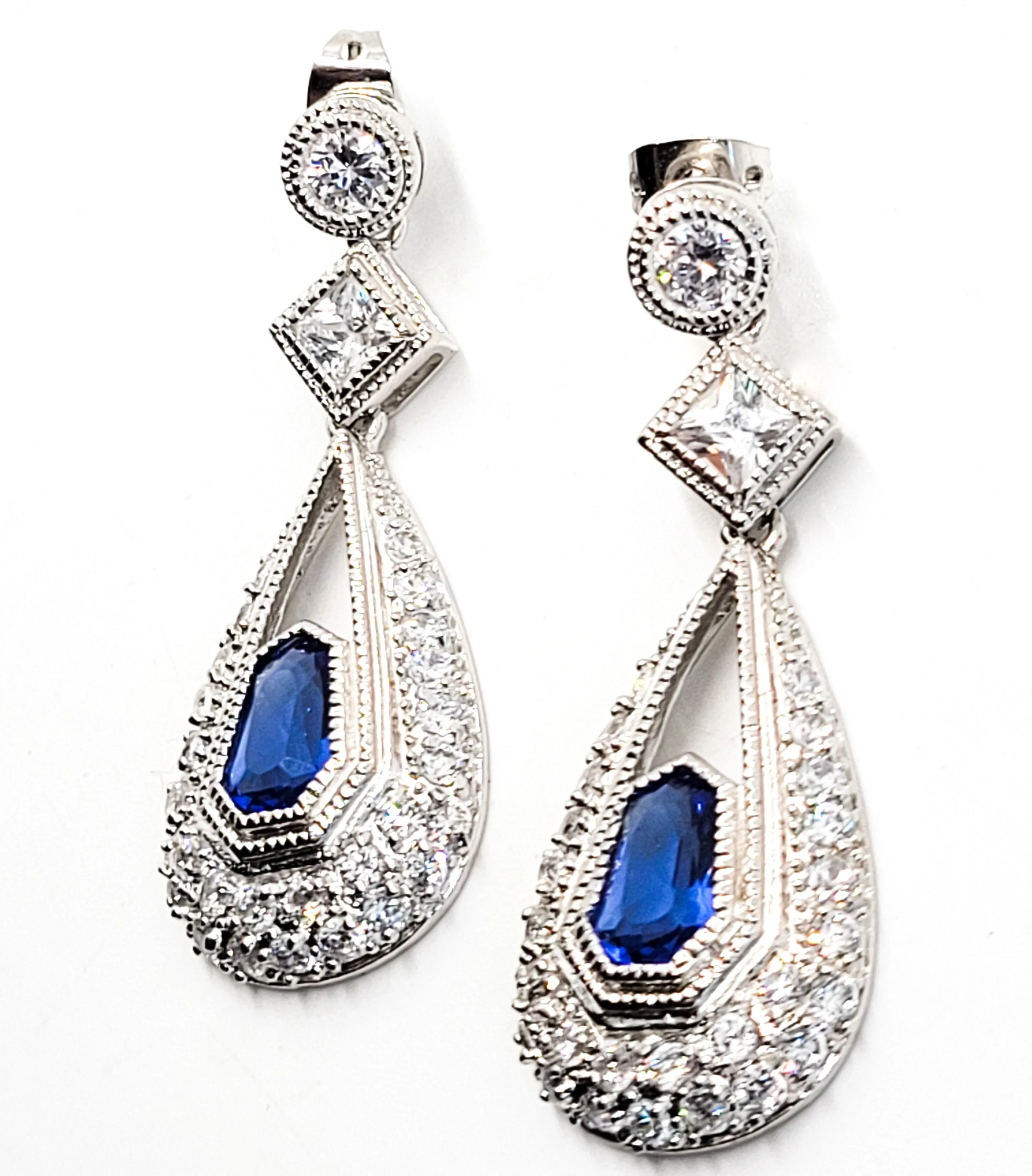 Sapphire blue silver plated princess cut pave set pierced earrings