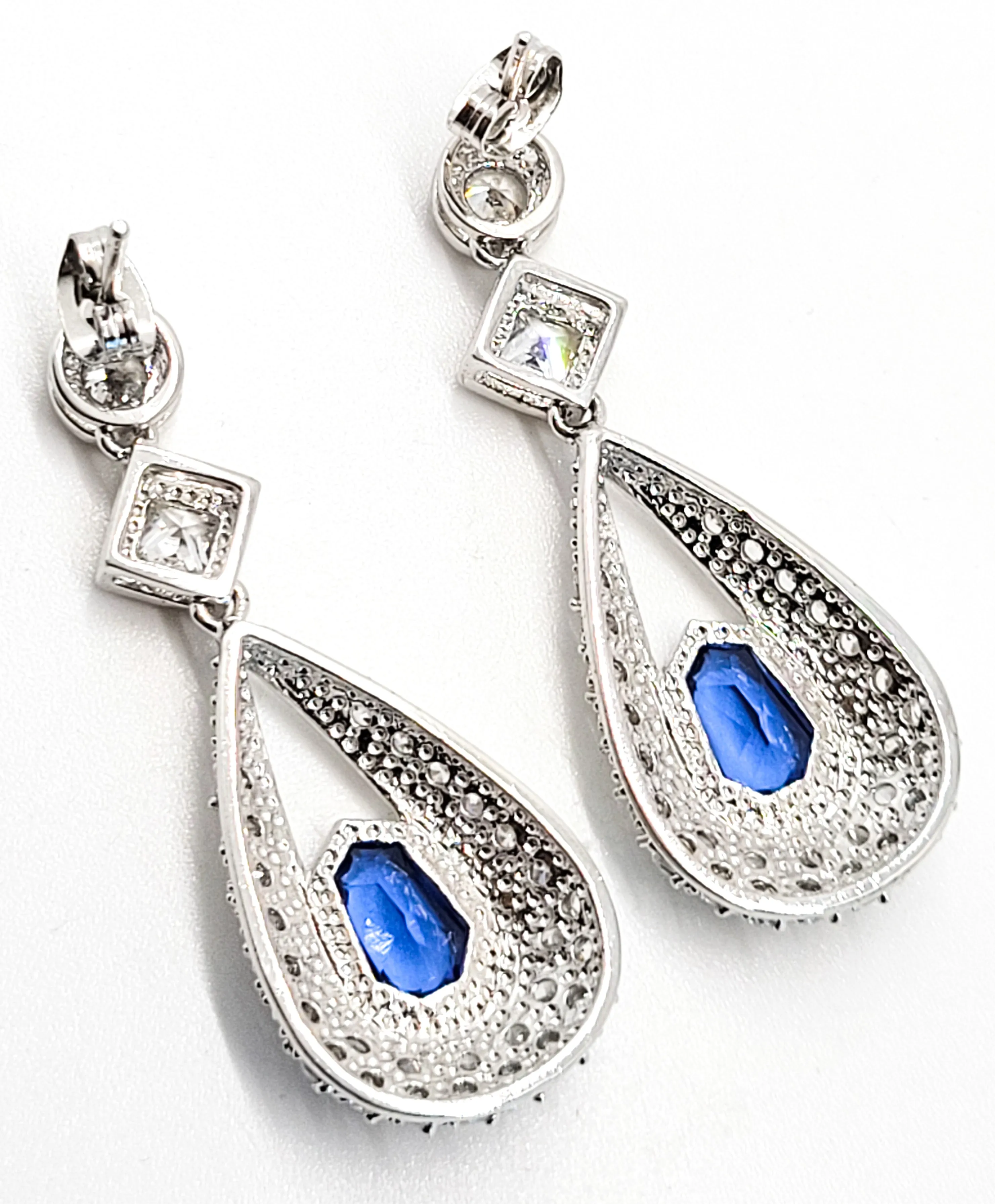 Sapphire blue silver plated princess cut pave set pierced earrings