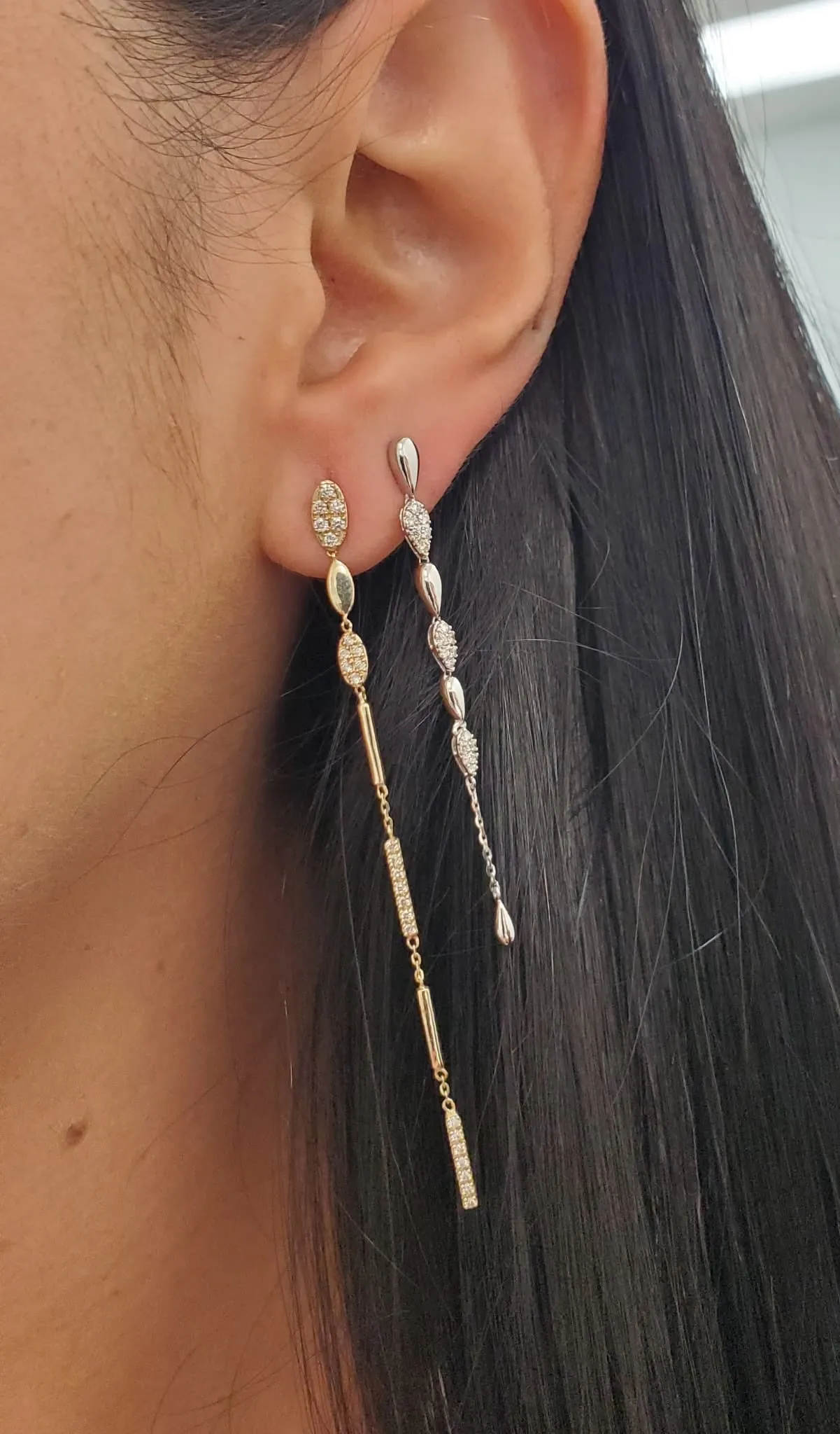 Stationed Gold And Diamonds Teardrop Dangle Earrings