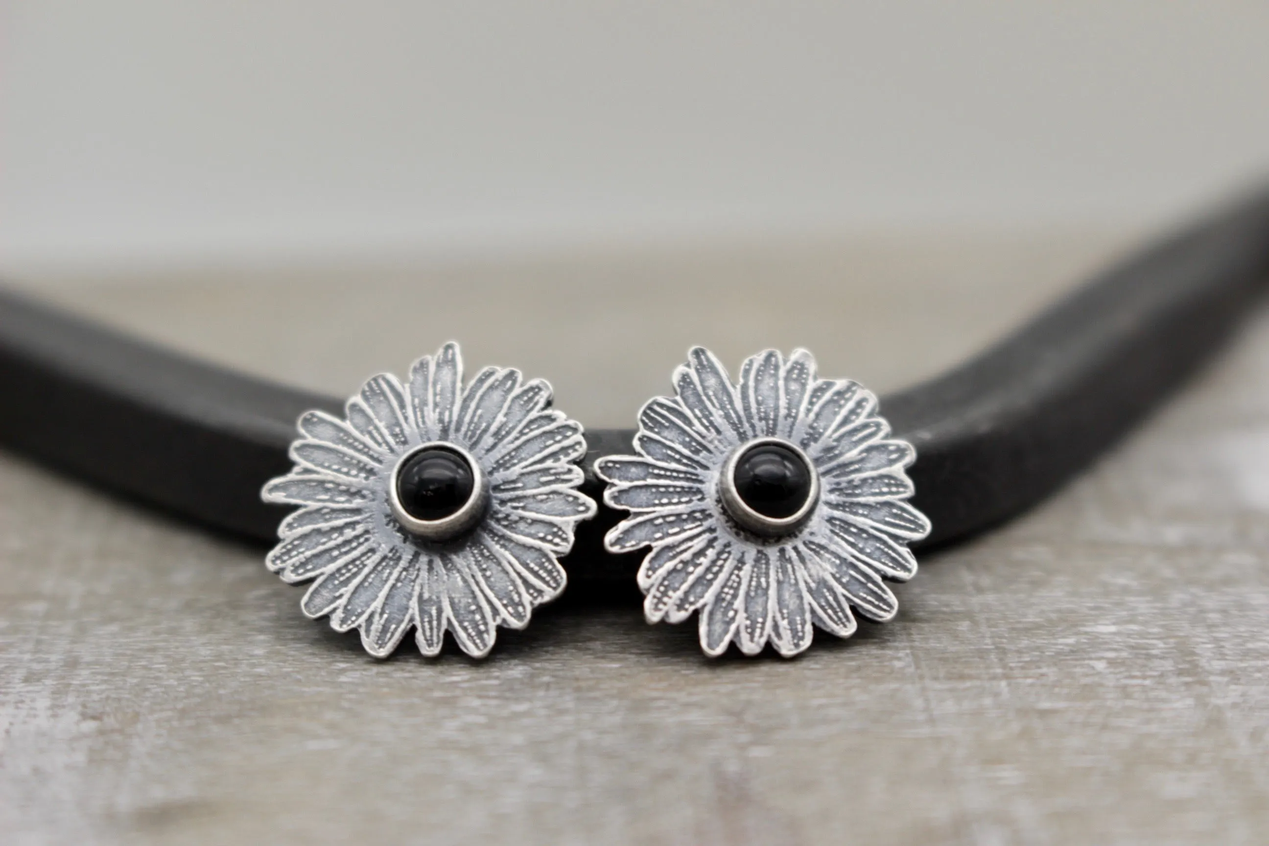 Sterling silver daisy stud earrings