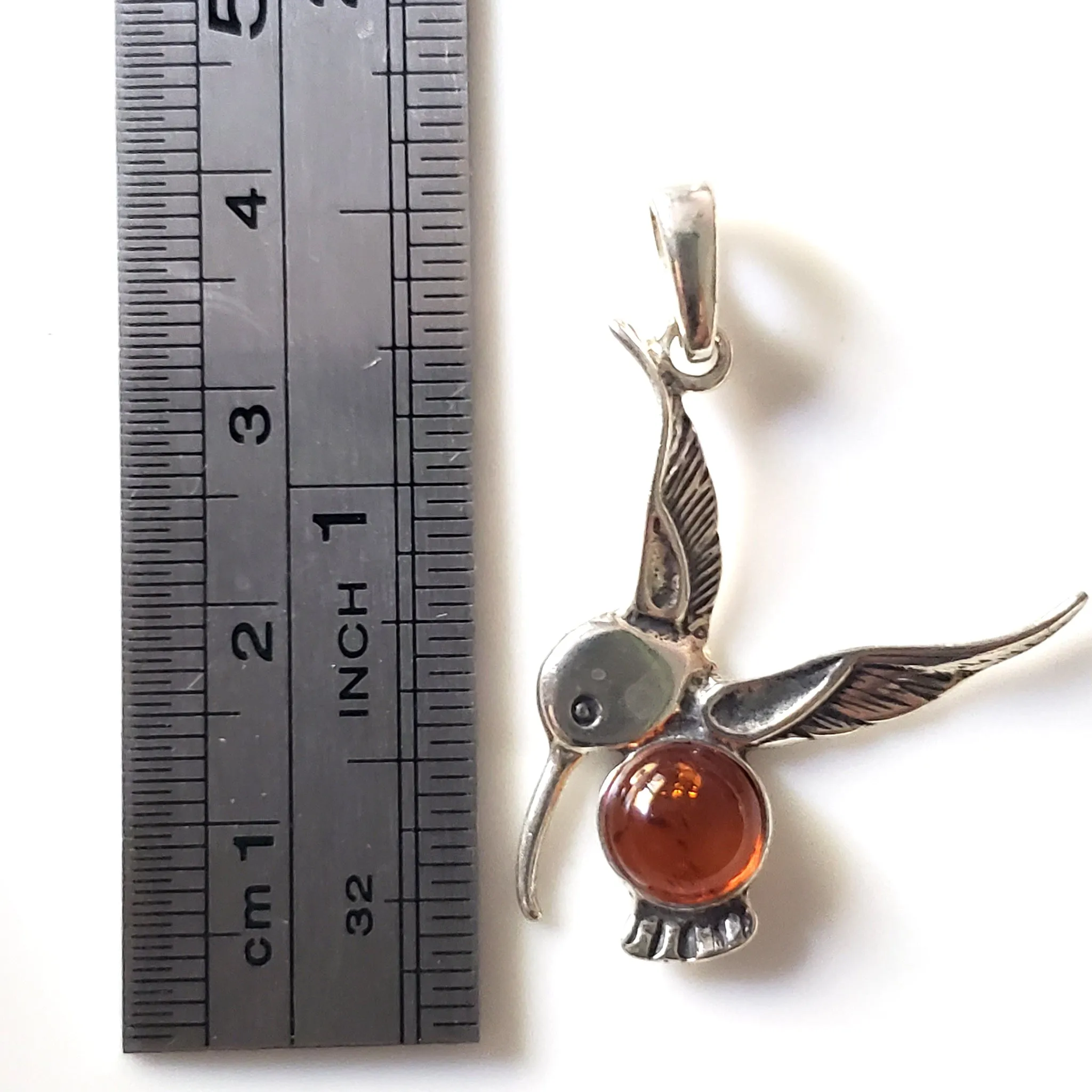 Sterling Silver Hummingbird Pendant with Natural Amber