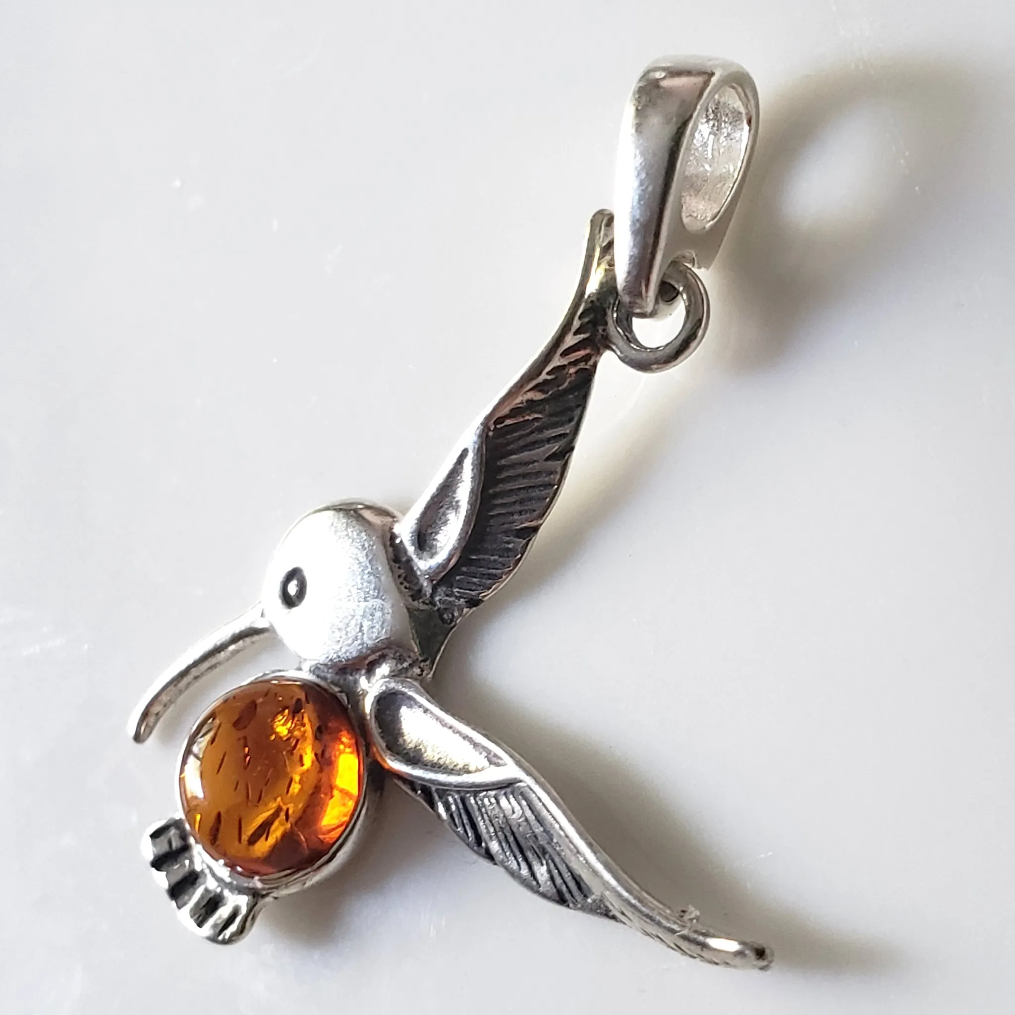 Sterling Silver Hummingbird Pendant with Natural Amber