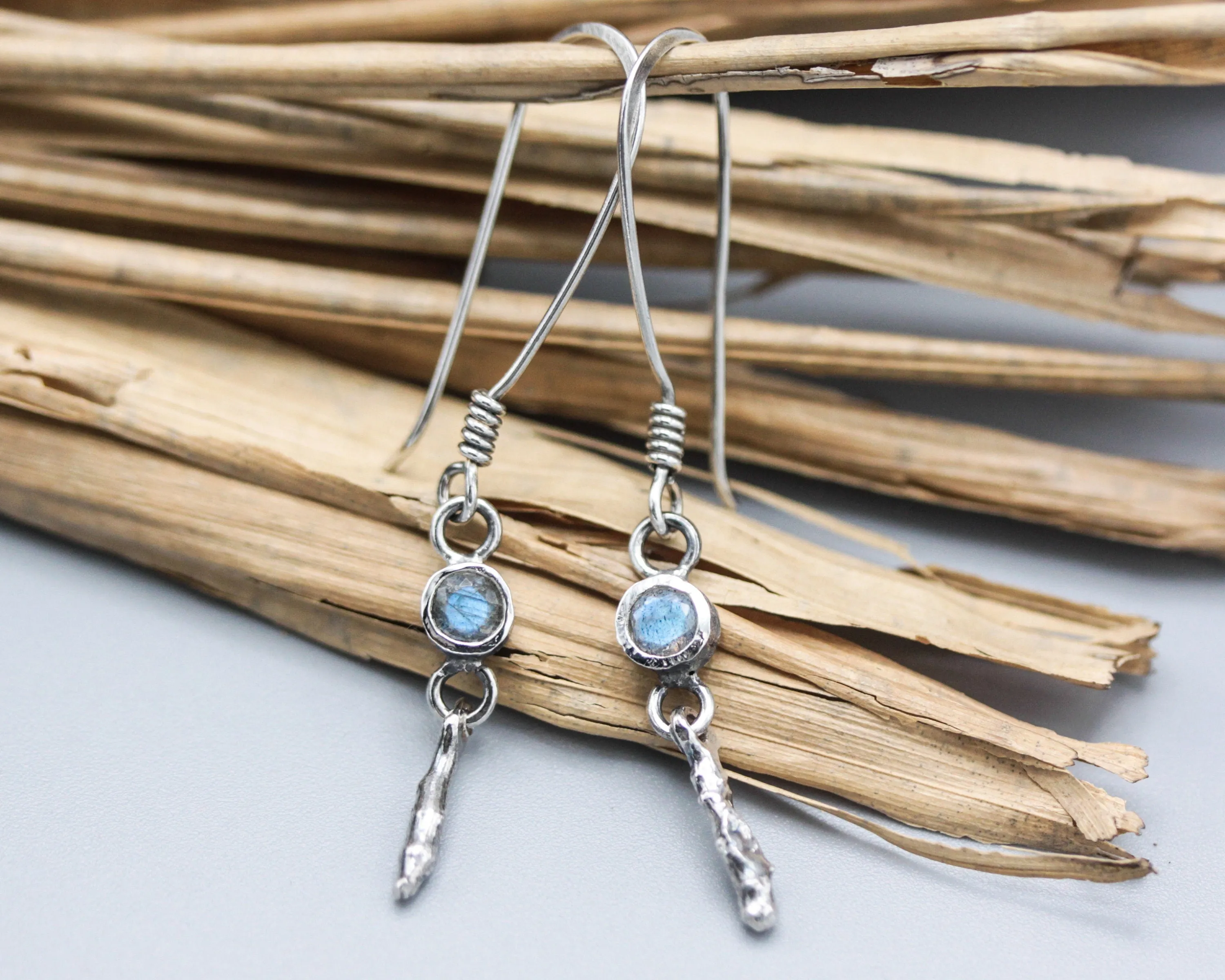 Tiny round faceted Labradorite earrings in silver bezel setting with silver sticks and hooks style on the top